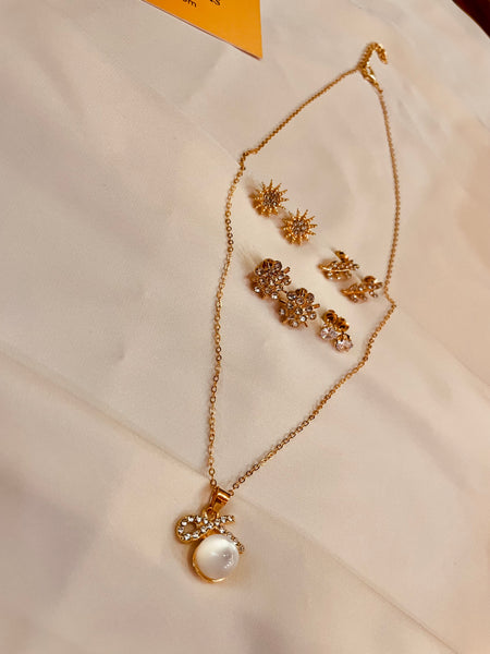 Bow Pearl Pendent Set With Four Interchangeable Stud's