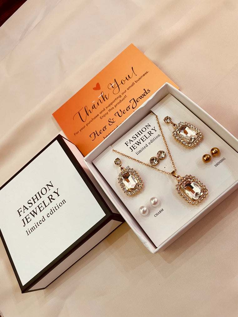 Crystal Cubic Zirconia Pendent Set With Drop Earrings and Three Stud's