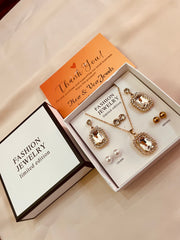 Crystal Cubic Zirconia Pendent Set With Drop Earrings and Three Stud's