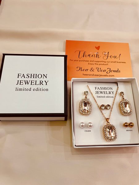 Crystal Cubic Zirconia Pendent Set With Drop Earrings and Three Stud's