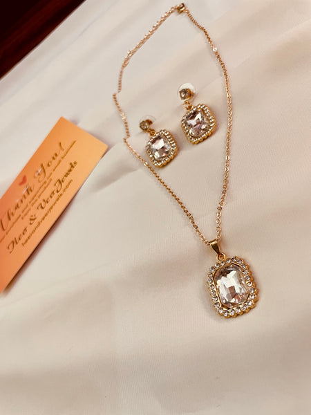 Crystal Cubic Zirconia Pendent Set With Drop Earrings and Three Stud's