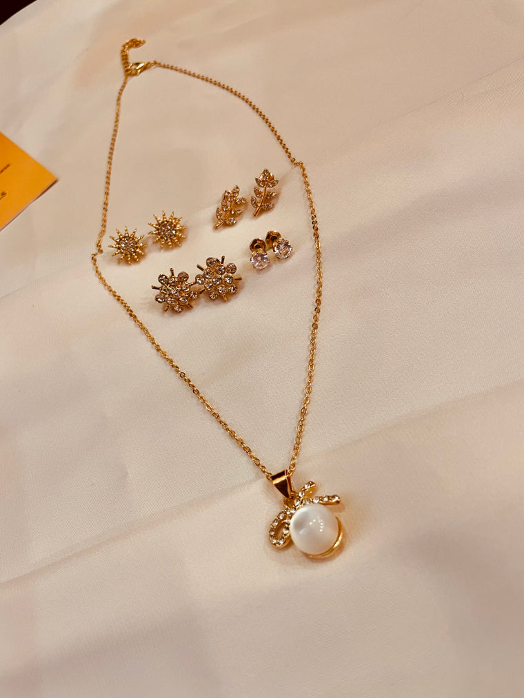 Bow Pearl Pendent Set With Four Interchangeable Stud's