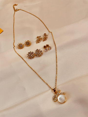 Bow Pearl Pendent Set With Four Interchangeable Stud's