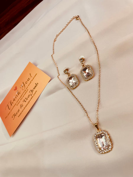 Crystal Cubic Zirconia Pendent Set With Drop Earrings and Three Stud's